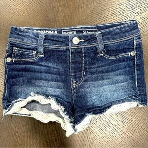 Dark blue shorts with lace ruffles
